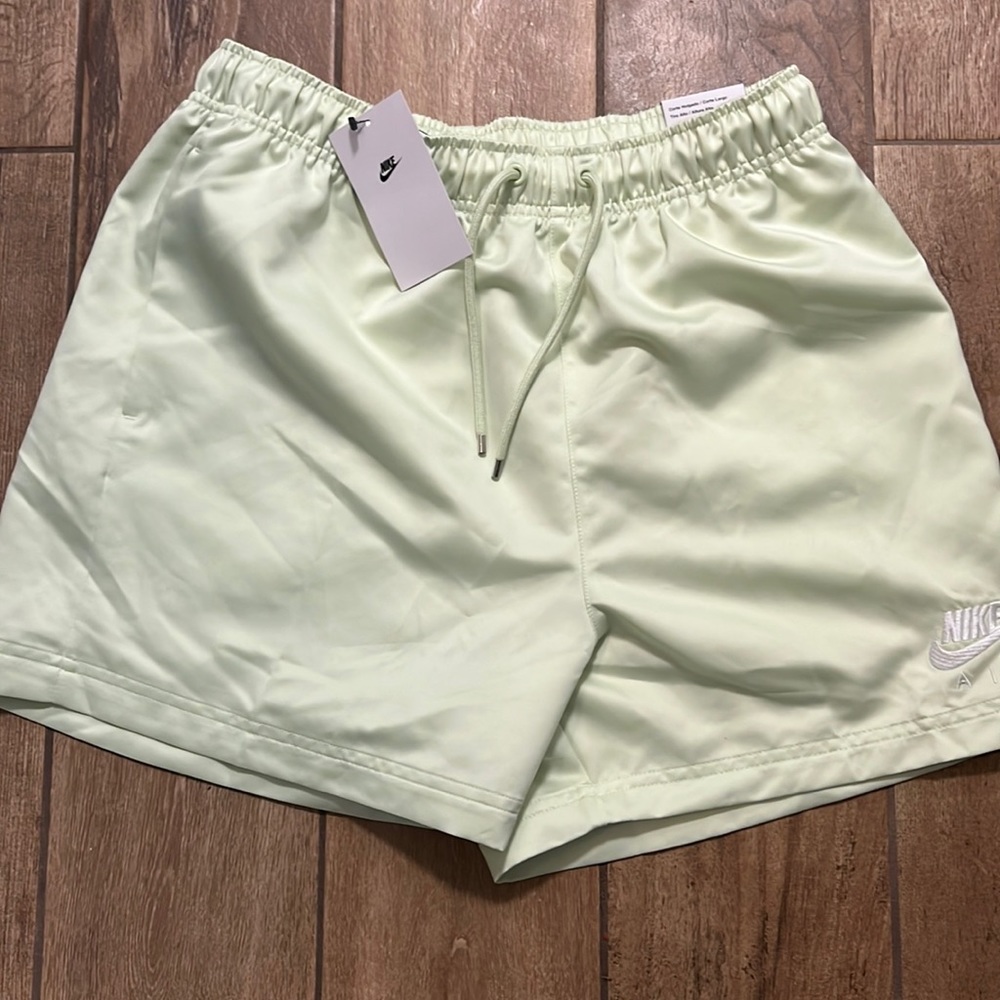 Nike women’s Nike air satin dazzle workout shorts. New with tags $50 retail.